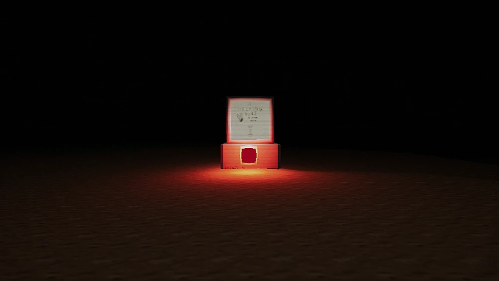 A red computer in the dark.